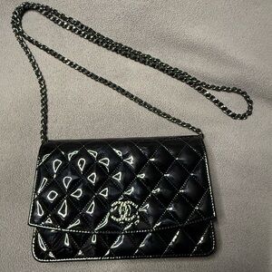 CHANEL Glossy Black Quilted Crossbody Bag